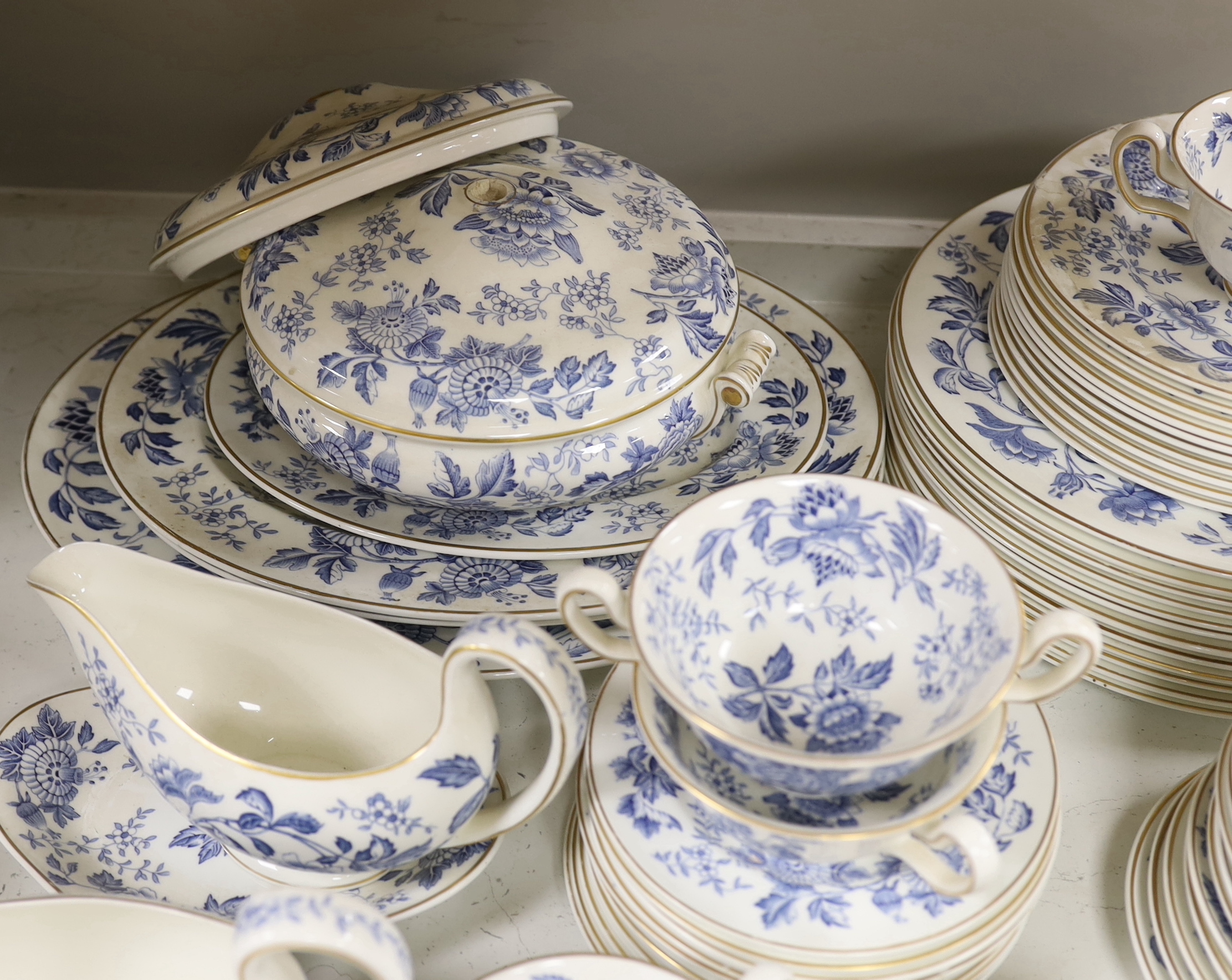 A Wedgwood bone china blue and white dinner service including oval platters, sauce boats and a tureen